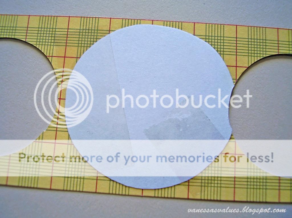 Tape the pictures to the back of the strip. If the pictures overlap Tape the pictures to the back of the strip. If the pictures overlap